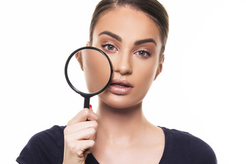 girl with dry skin problem holding magnifier close up concept beauty