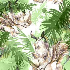 Watercolor exotic seamless pattern. Rhinoceros with colorful tropical leaves. African animals background. Wildlife art illustration. Can be printed on T-shirts, bags, posters, invitations, card.