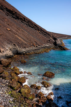 Sharp boulders, basalt ocean shore line.Cape Verde, Calhau volcano