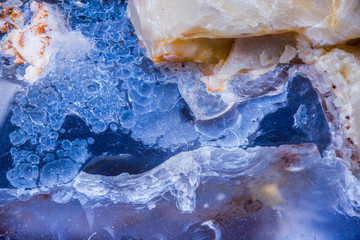 Blue and Beige stone as a microscopic Background texture.