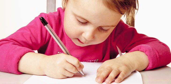 Little Beautiful Child Girl Writing A Letter. (Education, Studies, Success, Happy Childhood Concept)