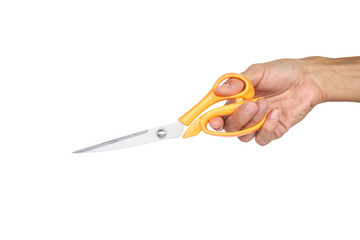 Hand holding scissors isolated on white background with clipping path.