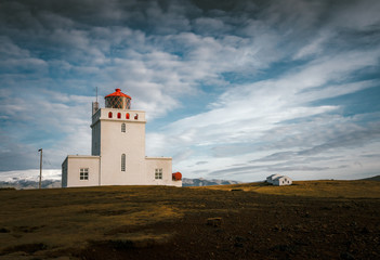 Fototapeta na wymiar Dyrhólaey Lighthouse at Dawn