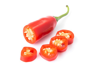 Closeup top view red chili pepper with sliced on white background, raw food ingredient concept