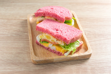 Healthy food. Bread sandwich with egg,mash potato,tomato and Salad on wooden table