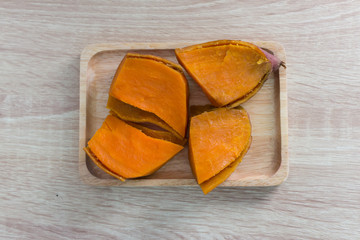 Sweet potato on the wooden table