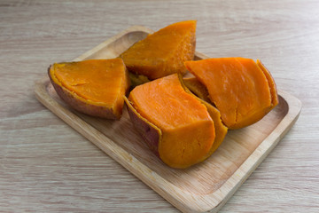 Sweet potato on the wooden table