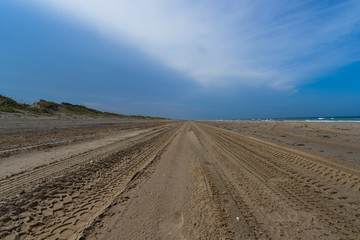 Fototapeta na wymiar Tracks in the sand