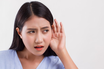 sad frustrated unhappy woman listening ear to bad news or having hearing impair, hard of hearing