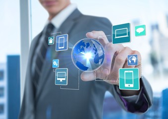 businessman with hand spread of  taking earth with application