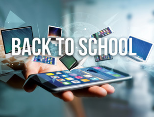 Back to school title surounded by device like smartphone, tablet or laptop - Internet and communication concept