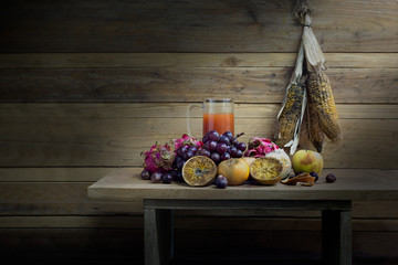 Pile of rot and withered fruits on the old plank