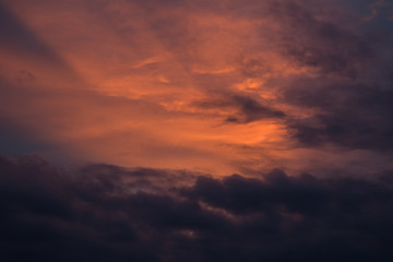 dark clouds with sunset lighting