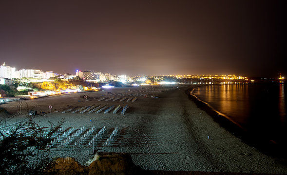 Night beach in Portimao, Portugal.