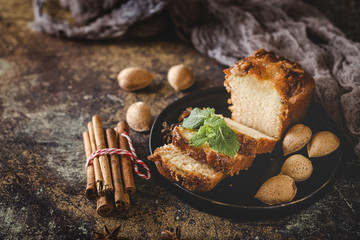 Homemade cinnamon cake and almonds