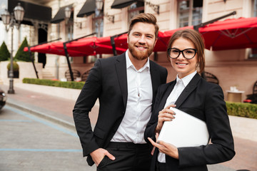 Portrait of a smiling attractive man and woman