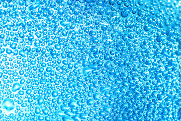 water drops on blue glass