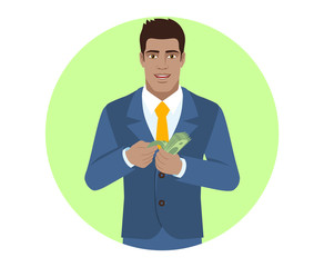 Businessman counts the money