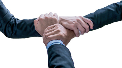 Fototapeta premium The soft and selective focused of businessmen put hands together in the concept of team work and coorperation.