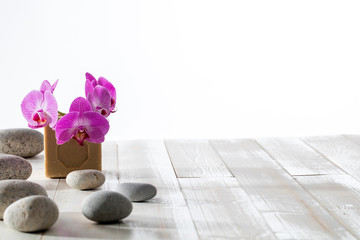 zen pebbles, orchids and traditional Marseille olive oil soap
