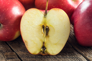 Fresh apples on wooden surface