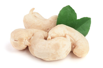 cashew nuts with leaf isolated on white background. macro