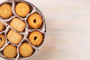 Closeup of Danish butter cookies in tin with copyspace