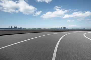 Fototapeta premium urban traffic road with cityscape in background in Shanghai,China..