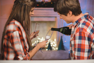 couple celebrating christmas at home