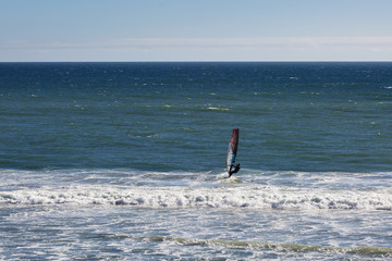 Wind kite surfer in pacific ocean