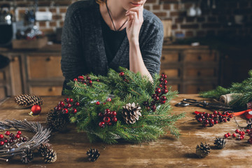 decorator with Christmas wreath