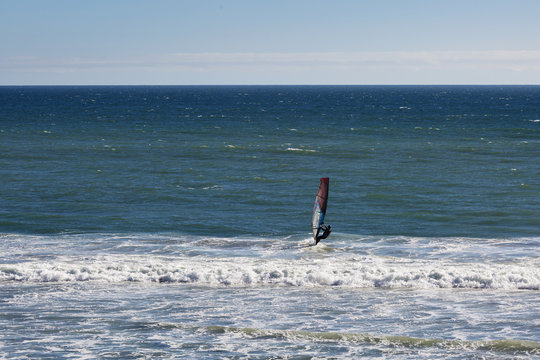 Wind kite surfer in pacific ocean