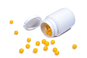 Medical plastic container with orange vitamins