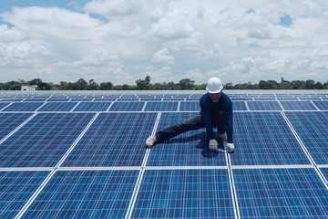 engineer team working on replacement solar panel in solar power plant;engineer and electrician team...