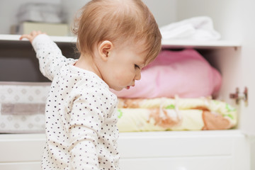 Little girl in her children's room