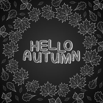 Hello Autumn leaves drawn with chalk on black chalkboard