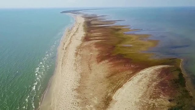 Sacalin Island, narrow strip of land separating the Danube Delta wetland region from the Black Sea in Romania, wildlife refuge, aerial view