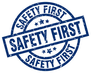 safety first blue round grunge stamp