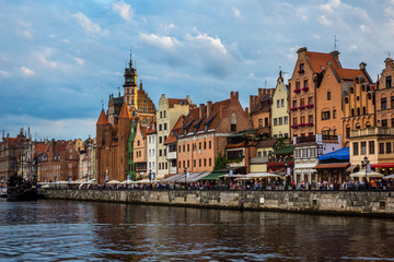 Naklejka na ściany i meble Mariacka Gate and historic buildings on old town in Gdansk city, Poland