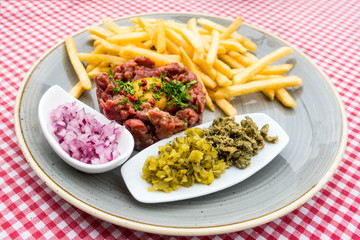tasty Steak tartare (Raw beef) - classic steak tartare on white plate