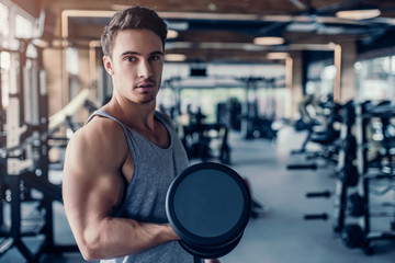 Fototapeta premium Sports man in gym