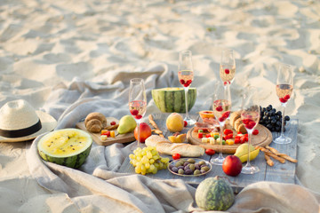 Group of friends enjoying  with champagne at the Beach