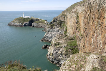 Fototapeta na wymiar Cliffs and Lighthouse at South Stack, Holy Island; Anglesey