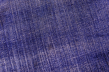 Texture of a blue jeans.  Fabric background