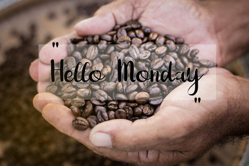 Hello Monday words on coffee beans background