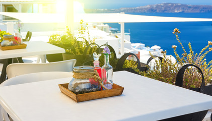 set table dining with views of the Caldera and sea Santorini Greece