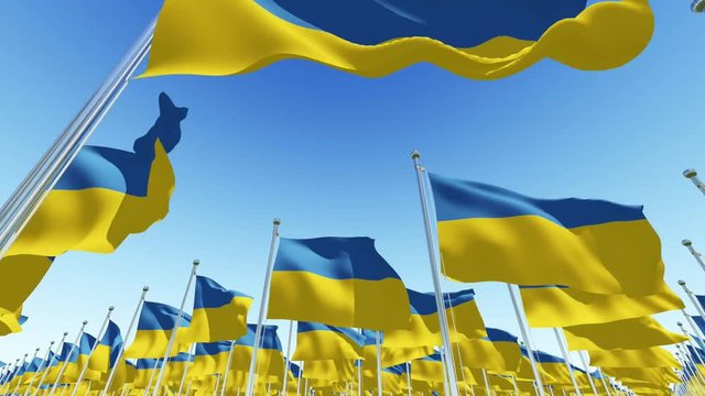 The National Ukraine flags on flagpoles against blue sky. Three dimensional rendering 3D rendering animation.