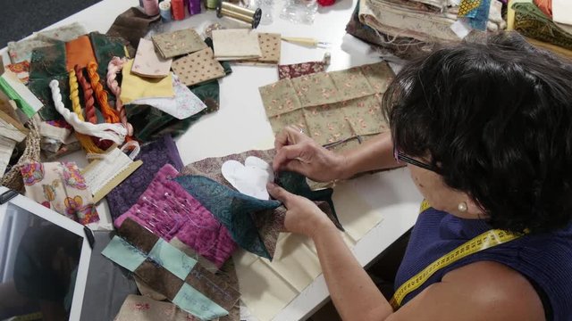 woman sewing patchwork