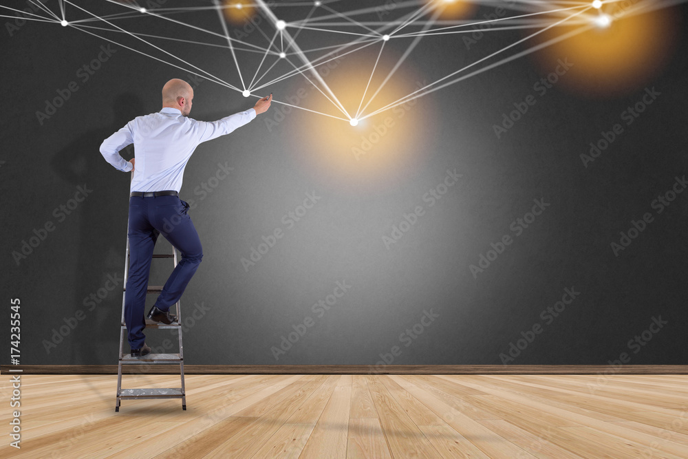 Poster businessman in front of a wall with web operating system screen and network connection displayed on 