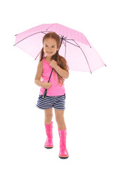 Adorable little girl with umbrella on white background